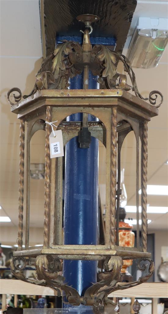An early 20th century hexagonal gilt brass hall lantern height 72cm